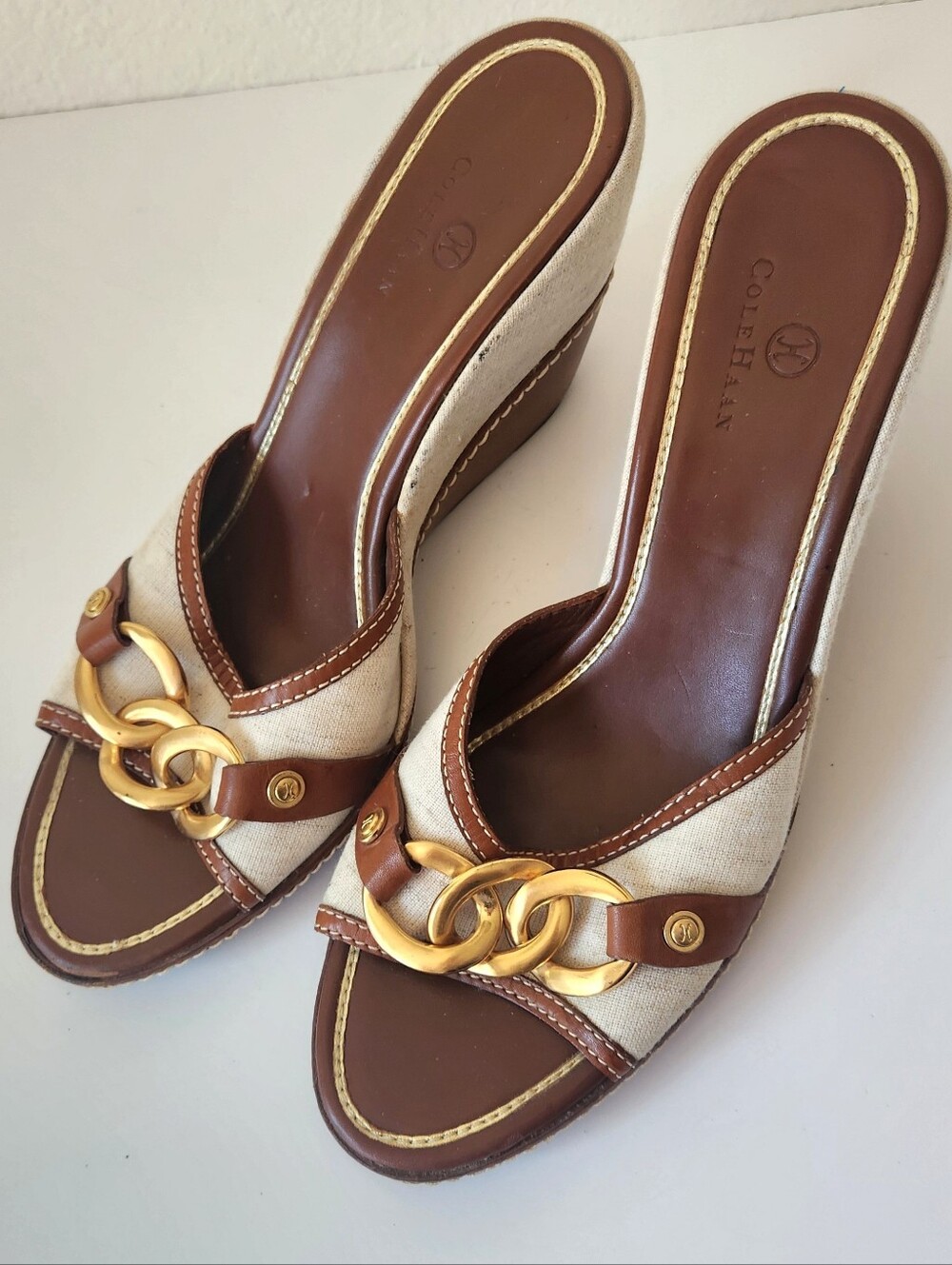 Cole Haan Beige and Brown Wedge Mules with Gold Chain Detail